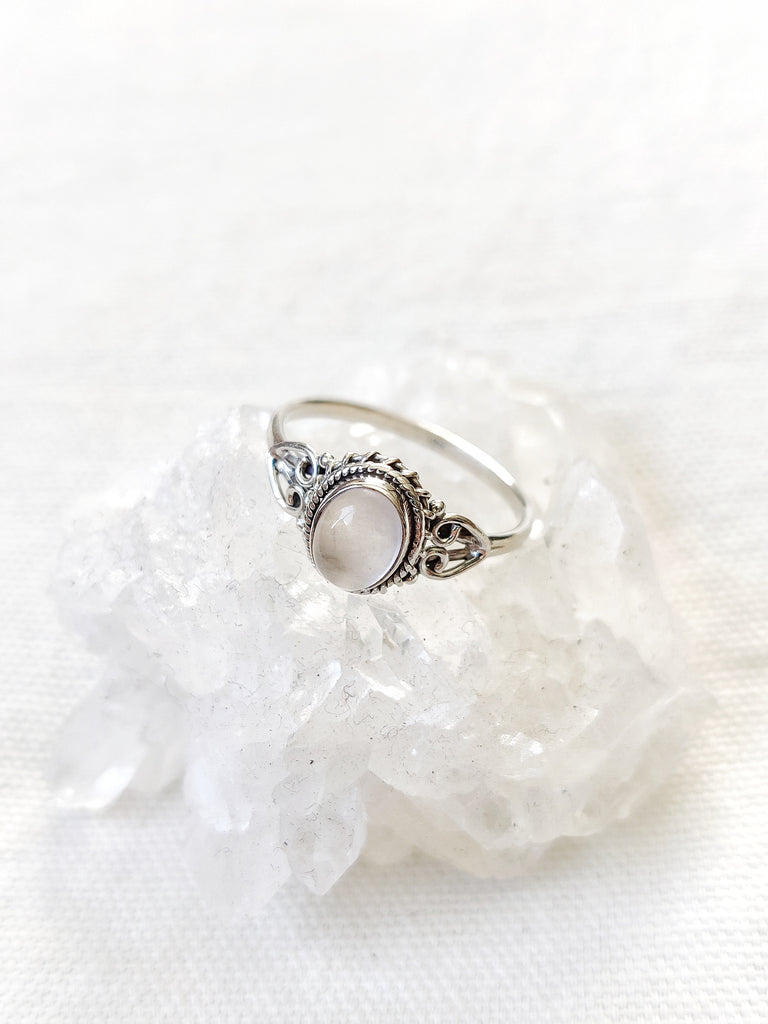 This is three sterling silver rings with an oval crystal gemstone. One has a tigers eye gemstone brown in colour, one has a chalcedony gemstone light blue in colour and one has a moonstone gemstone rainbow white in colour, all are available at our third eye crystal and jewellery store in Auckland, New Zealand